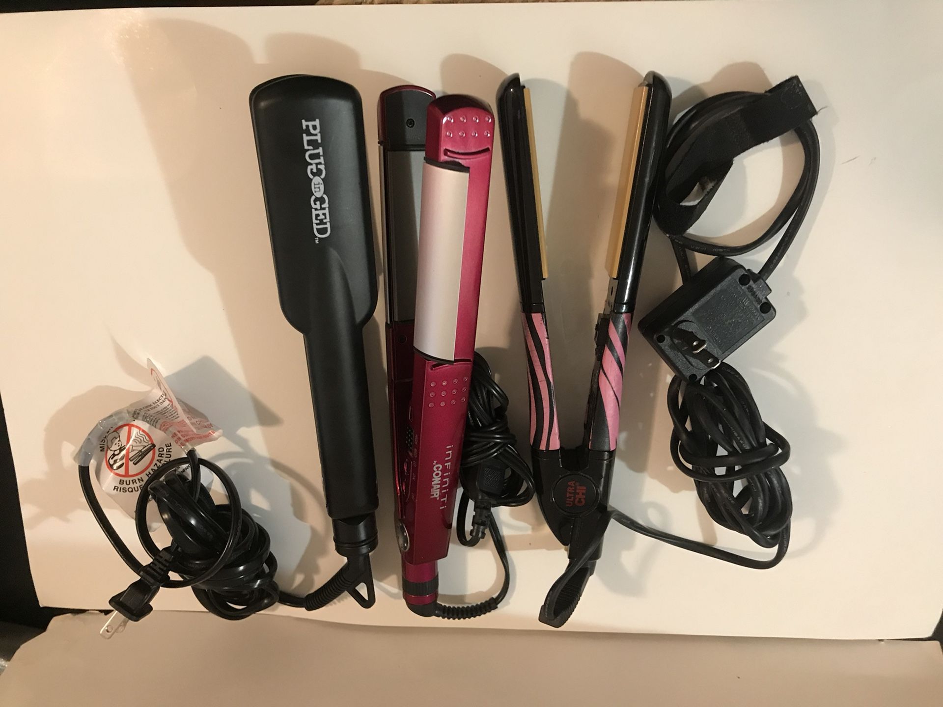 Plug in ged ,conair and chi hair straighteners