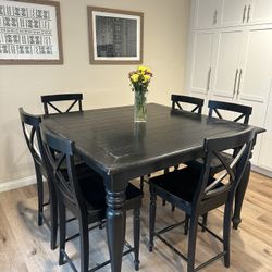 Bar Height Table and 6 chairs 