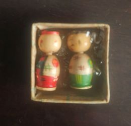 Miniature Japanese kokeshi dolls