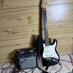 Electric Guitar + Amplifier