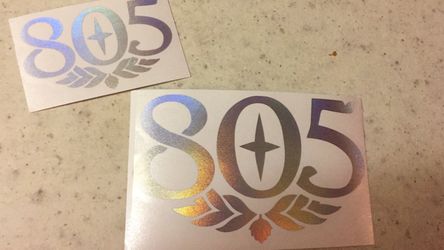 Small and large metallic 805 logos