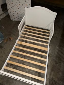 White Toddler size bed