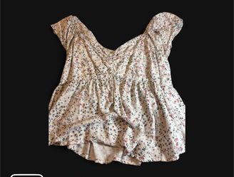 flower cropped off the shoulder