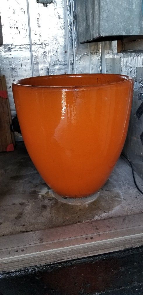 Orange ceramic planter pot