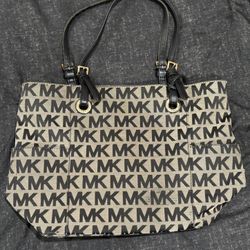 Michael Kors signature logo canvas tote bag with black leather straps