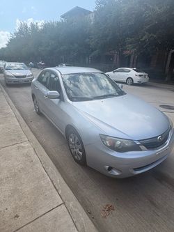 Subaru Impreza Silver 4-Door Sedan