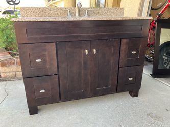 Dark Wood Bathroom Vanity with Granite Top and Mirror