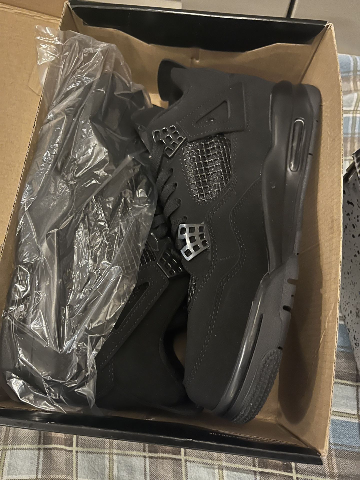 Black Jordan 4s