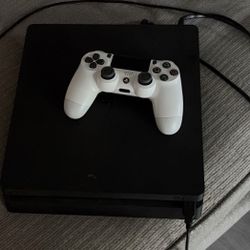 PS4 with controller 