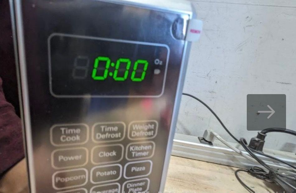NEW MICROWAVE