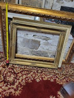 Lot of 3 large picture frames with fancy designs with gold border