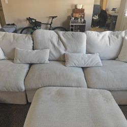 Kennedy Cream 122" 3 Piece Power Reclining Modular Sofa with USB | Fabric | Track Arms | Loose Reversible Back And Ottoman
