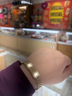 Esclava de versace en 14k con placa