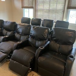 9 black movie theater chairs. Fully recline..