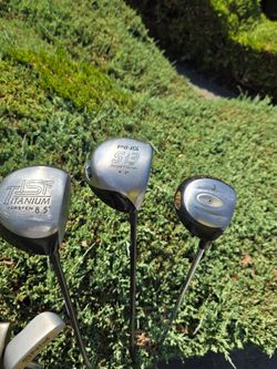 Golf Clubs  pings drivers  and 2 ping putter