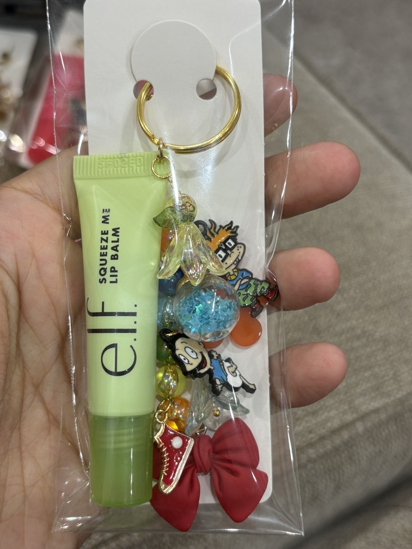 Hand beaded lip balm keychains Elf Balm included