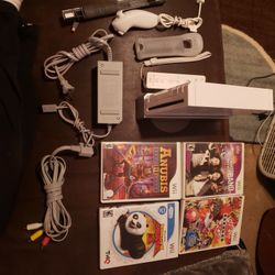 Nintendo Wii System With 4 Games, Controller,av Cord,power Cord,sencor Bar ,console Etc.