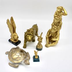 6 golden statues/figurines 