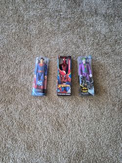 Superman, Spiderman, and Joker figurines
