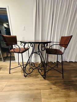 Pier 1 imports bar top table and 2 chairs