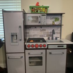 KidKraft Uptown Elite Espresso Play Kitchen with EZ Kraft Assembly™, Lights and Sounds, Working Ice Maker and Click and Turn Knobs