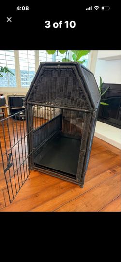 Like new, beautiful decorative wicker dog kennel/crate