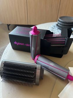 Unused dyson air wrap attachments