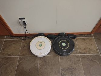 2 Roomba Vacuums