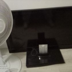 Emerson 42" TV with Stand.