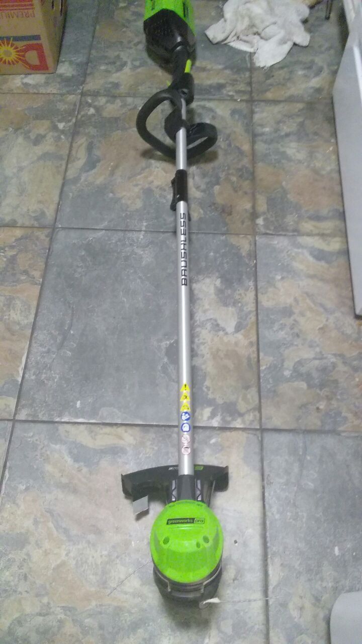 GREENWORKS PRO 60 VOLT BATTERY OPERATED CORDLESS STRING TRIMMER for