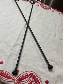 Set of drape or curtain pulls , 23.5" long. unique, older vintage. The go on curtain rod a clip to drapes or curtains . Gives a touch of style