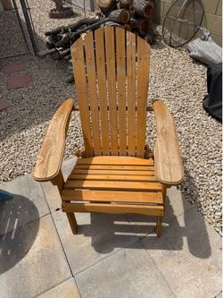 Wooden Adirondack chair with cushion