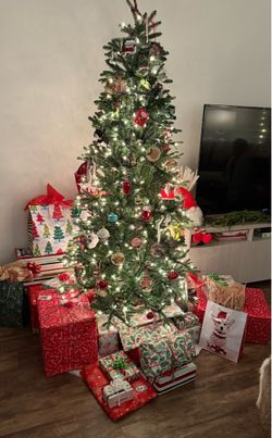Christmas tree with Lights and carrying roller containea