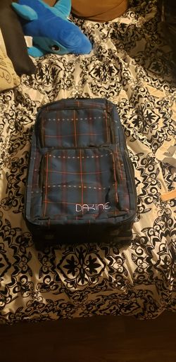 Dakine Carey On Luggage