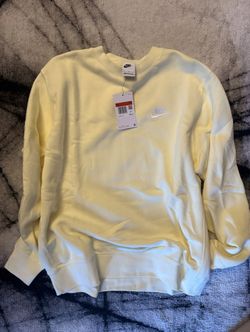 This is a Nike Sportswear Club Fleece men's crewneck sweatshirt in the color alabaster white. New. Size L