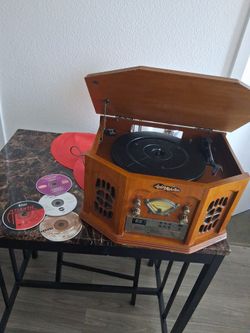 It's a Anders nicholson cd player with a record player