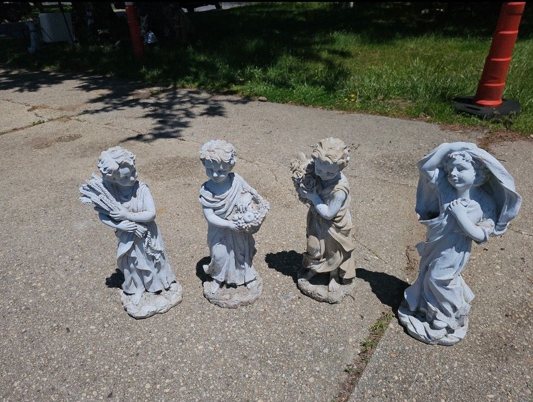Price Is Firm.. Four Beautiful Garden Statues