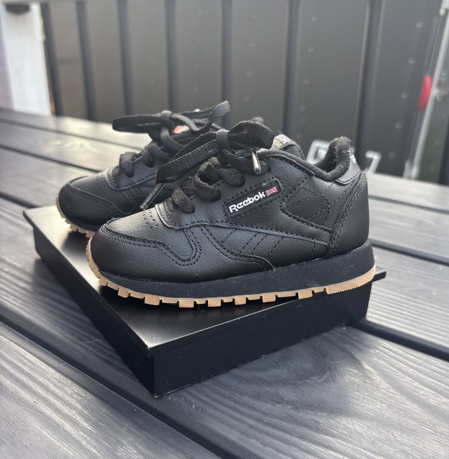 Reebok Classics, black gum bottom *size 5c*