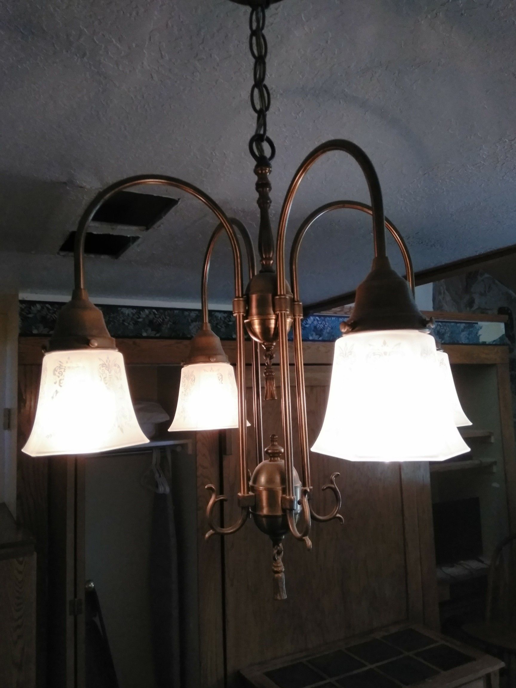 Multiple bronze chandeliers