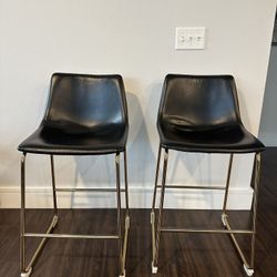 2X Blacks and Gold Bar Stools