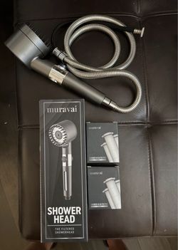Two Brand new Muravai filtered shower heads with filters
