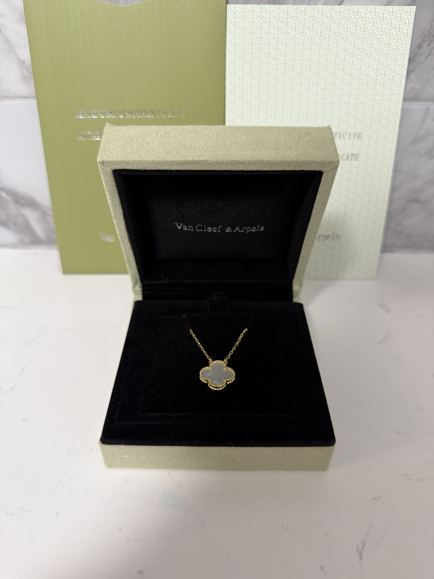 White Van Cleef Necklace and bracelet