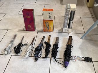 A Box Of Curling And Straightening Irons In La Quinta, CA