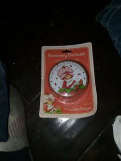 Vintage old item new in box strawberry 🍓 shortcake coasters I have 2 packs of them