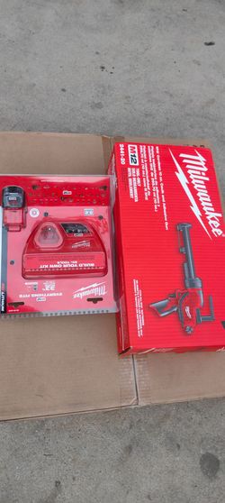New m12 Caulk gun with new battery and charger