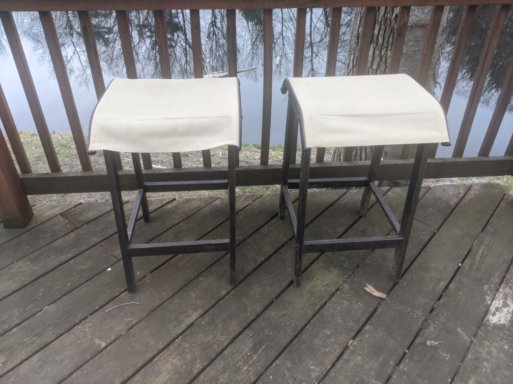 Two Outdoor Saddle Stools
