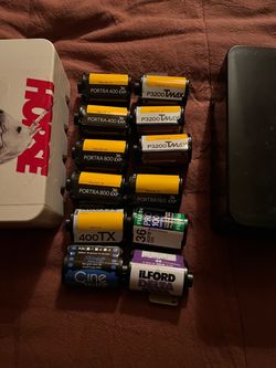 Variety of 35mm film and two film cases