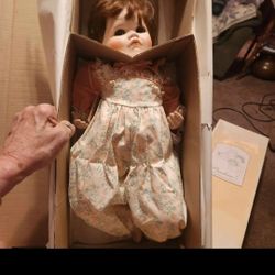 REDUCED TO $20.00

New in box...Collectible Doll "Sara" by Connie Walser Derek...she has never been out of the box....approximately 18 inches tall...