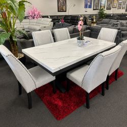 7 piece faux marble top dining table set