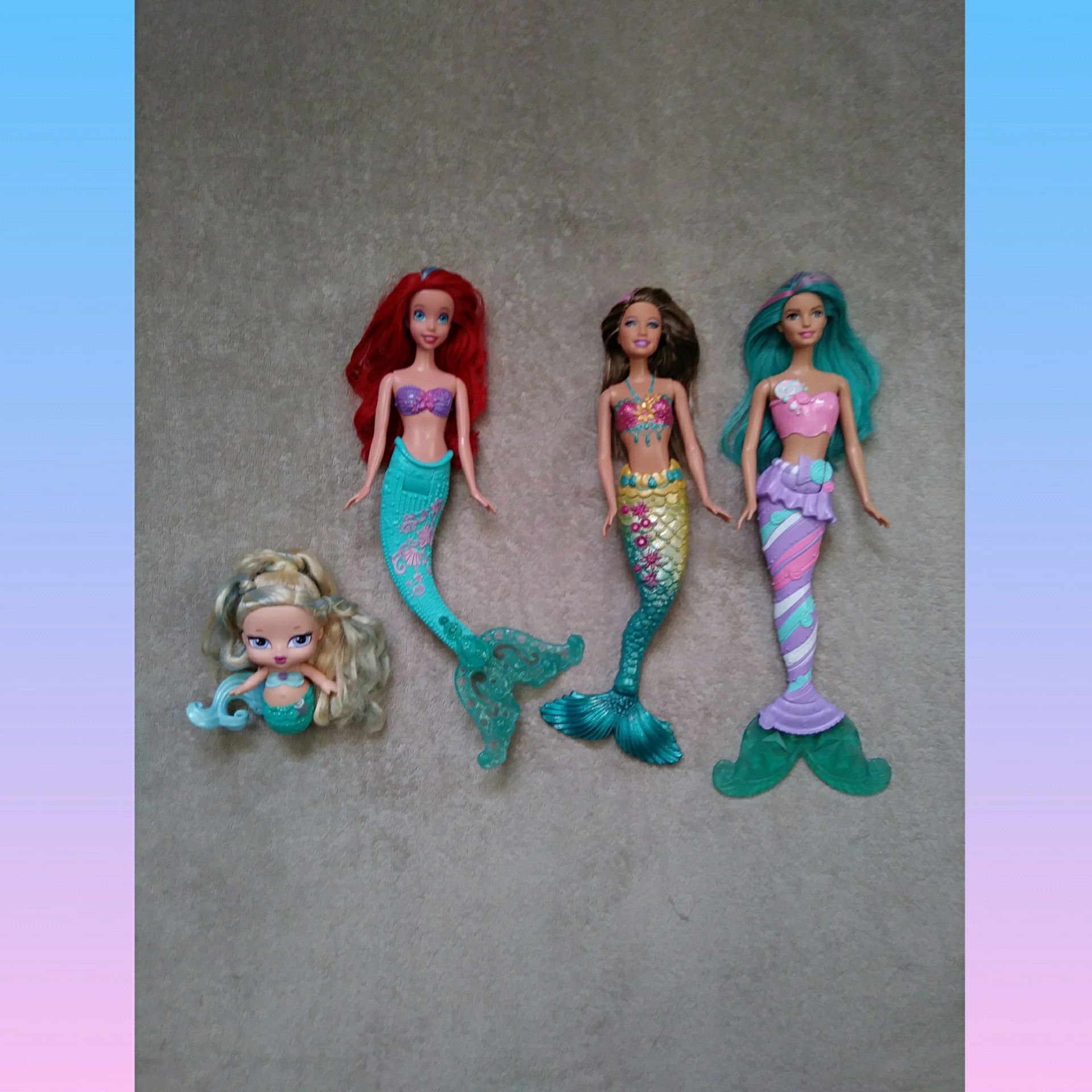 Disney Ariel, Barbie Mermaids and a Bratz doll